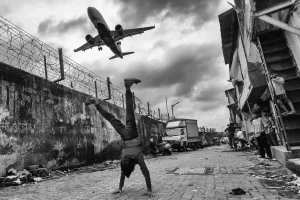 Define the gravity together, by Sanghamitra Sarkar - Street Silver Mention in the Black and White Photo Awards 2025